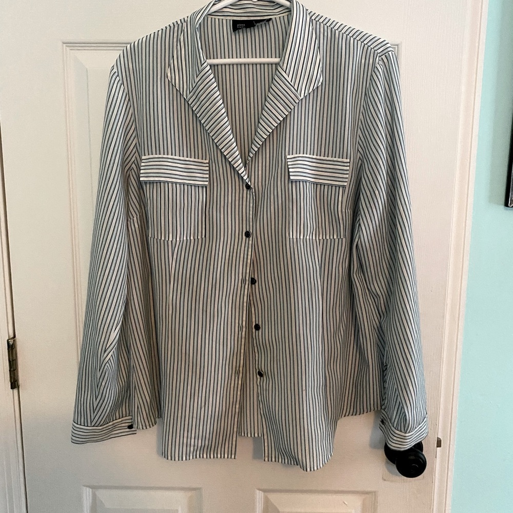 Synthetic button down long sleeve blouse.